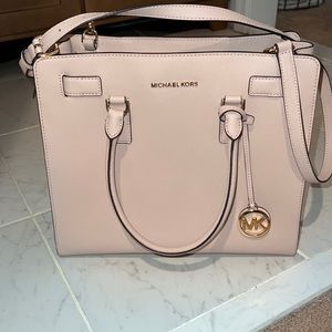 Never used- has original tags and care instructions